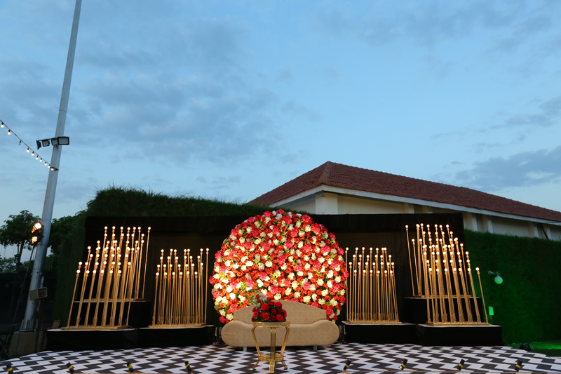 Crimson flower details on a luxurious mandap