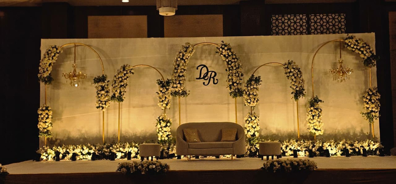 Luxury guest lounge with champagne fabrics and table candles